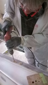 We now need to drill out he bolt holes to 1/4". Then they will be over drilled to 1/2" and filled with epoxy. Then we get to refit the toe rail and re-drill the holes.