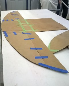 The plywood bulkhead will need to be split down the center to fit into the boat.