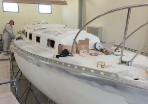 The starboard side is also fitted. Now we will decide where the life line stanchions will go and then remove the toe rail so we can cast all of the holes with epoxy. 