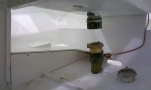 Here's what the autopilot shelf looks like with a coat of paint on it.  Looking at the picture we realized that we'll have to take the front piece off to bolt the hydraulic arm in place.  This will have to get done before the fuel tank goes back in and blocks access to the front piece.