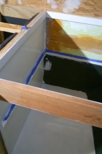 Pantry with primer and insulation on the lower area. 